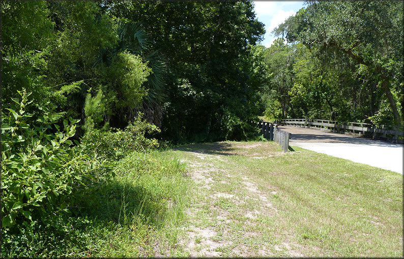 Southeastern bridge approach to Moultrie Creek.