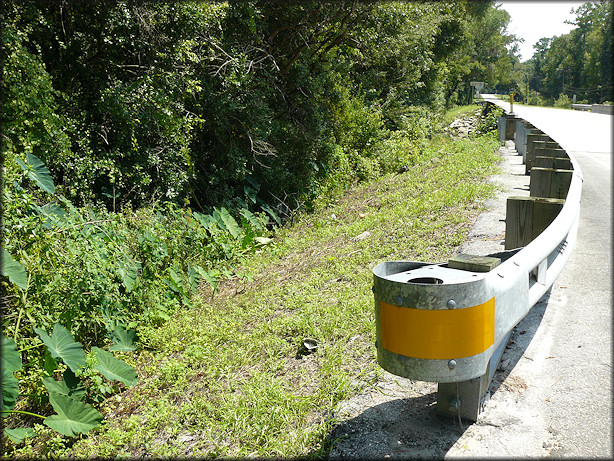 Northeastern bridge approach to Six Mile Creek