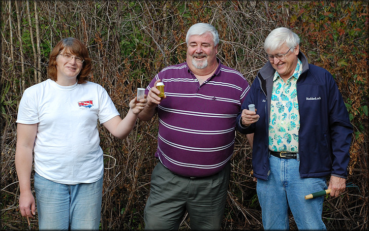 Stephanie Clark, Tom Grace And Harry Lee Show Off Their Finds From The Outback Crab Shack Station