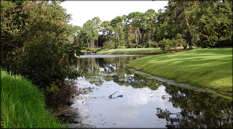 Water hazard near the 16th and 18th greens