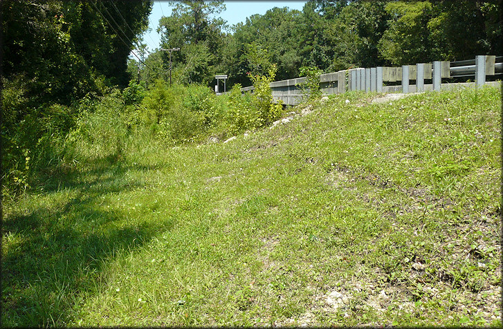 Southwestern bridge approach to Six Mile Creek