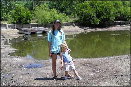 Mrs. Barsh and daughter with dead mollusks readily visible